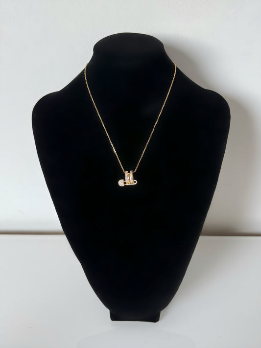 Collier avec pendentif en forme de rondelles empilées avec boucles d’oreilles offertes - Or